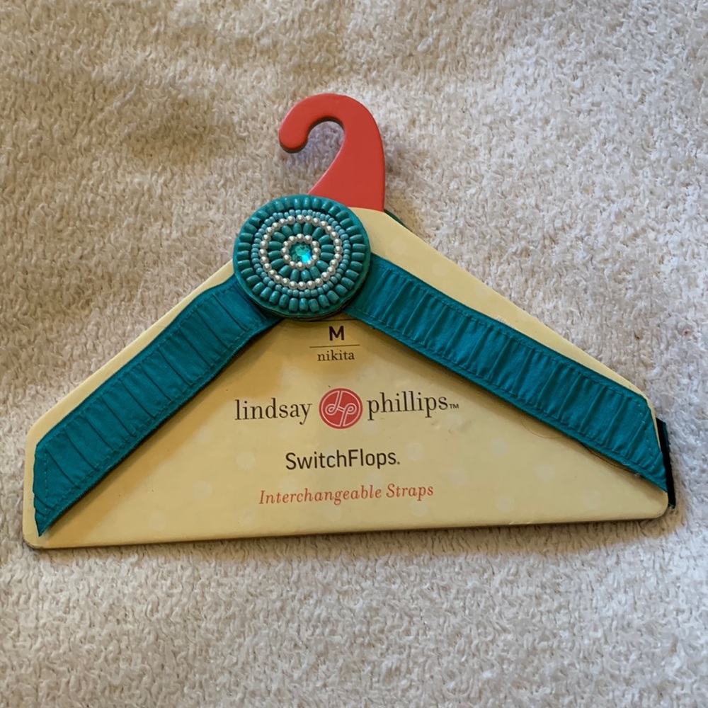 BRAND NEW Switch Flop teal straps by Lindsay Phillips. Size Medium.
